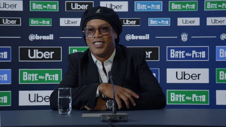 Na convocação da Seleção para Copa, Uber lança patrocínio à CBF ao lado de Ronaldinho Gaúcho